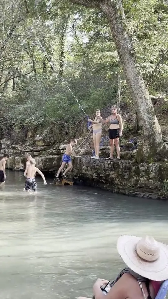 Cliff jumping into a Shultz Creek swimming hole